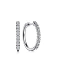 white gold hoop earrings with diamonds on a white background