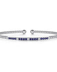 white gold bracelet with blue and white stones on a white background