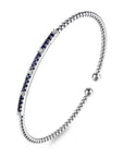 white bracelet with blue stones on a white background