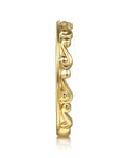 Gold earring with intricate design on a white background side view