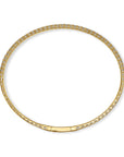 A 14k yellow gold rigid oval bangle bracelet from the 1.01 carat variant option, side profile view.