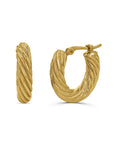 Gold textured hoop earrings on a white background