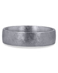 A 6mm men's wedding band by Furrer Jacot, crafted in solid 18k white gold and showcasing a distinctive, multi-directional matte brushed finish with an intricate cross-hatched texture.