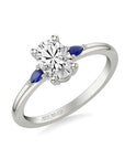 Classic Three Stone Diamond Engagement Ring with Pear Shaped Blue Sapphire Side Stones - Skeie's Jewelers
