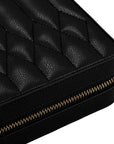 Close-up of a black quilted leather zip-around case with a gold-tone zipper, shown on a white background.