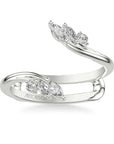 white gold ring with marquise-shaped diamonds on a white background