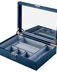 Blue jewelry box with compartments on a white background