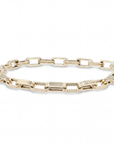 Gold chain bracelet on a white background