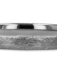 WHITE GOLD BAND WITH A SCRATCHY TEXTURE ON A WHITE BACKGROUND