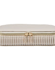 Cream color jewelry box with gold zipper closed front view on a white background