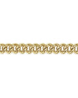 Gold curb chain on a white background close up