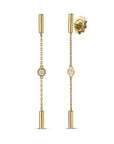Gold earrings with chain and circular elements on a white background