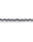 Close-up of a silver chain bracelet on a white background
