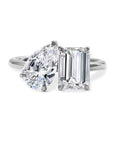 lab created Diamond ring with heart-shaped and emerald-cut diamonds on a white background