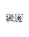 Pair of earrings with lab diamonds on a white background