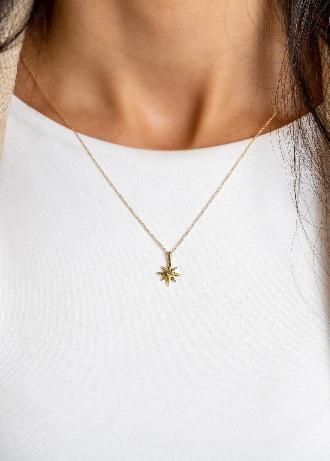 Yellow Gold Diamond Star Pendant Necklace by Carla | Nancy B. - Skeie's Jewelers