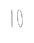 Two diamond earrings on a white background