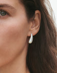 Georg Jensen Silver reflections Drop Earrings modeled close up