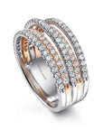 diamond rings with rose gold and white gold bands on a white background