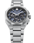 Silver Seiko watch with a blue face on a white background