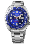 Seiko watch with blue dial and silver metal strap on a white background