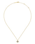 A delicate yellow gold chain necklace with a small round pendant featuring a clear gemstone surrounded by a gold border, displayed on a clean white background.