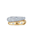 Two rings, one silver and one gold with diamonds, on a white background