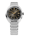 Seiko watch with a gradient black dial and silver metal strap on a white background