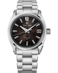 A Grand Seiko wristwatch with a polished stainless steel link bracelet and a dark wood-grain dial, shown against a solid white background.