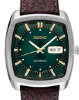 Seiko watch with green face and brown leather strap on white background