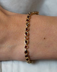 Garnet Bezel-Set Gold Bracelet - Skeie's Jewelers