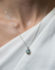 Elongated Cushion-Cut Aquamarine Bezel Pendant - Skeie's Jewelers