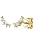 Gold earrings with diamond accents on a white background