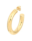 Close up view Gold hoop earring on a white background