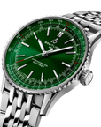Breitling watch with green dial and silver metal bracelet on a white background