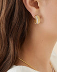 Marco Bicego Gold Coil and Diamond Huggie Earrings - Skeie's Jewelers