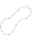 Necklace with blue and clear beads on a white background