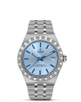 Silver watch with blue dial on a white background
