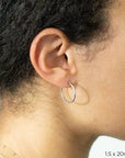 White Gold Tube Hoop Earrings by Carla | Nancy B.