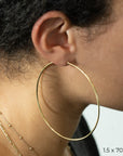 Yellow Gold Tube Hoop Earrings by Carla | Nancy B. 1.5x70mm Modeled
