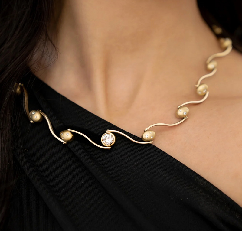 A gold and diamond necklace