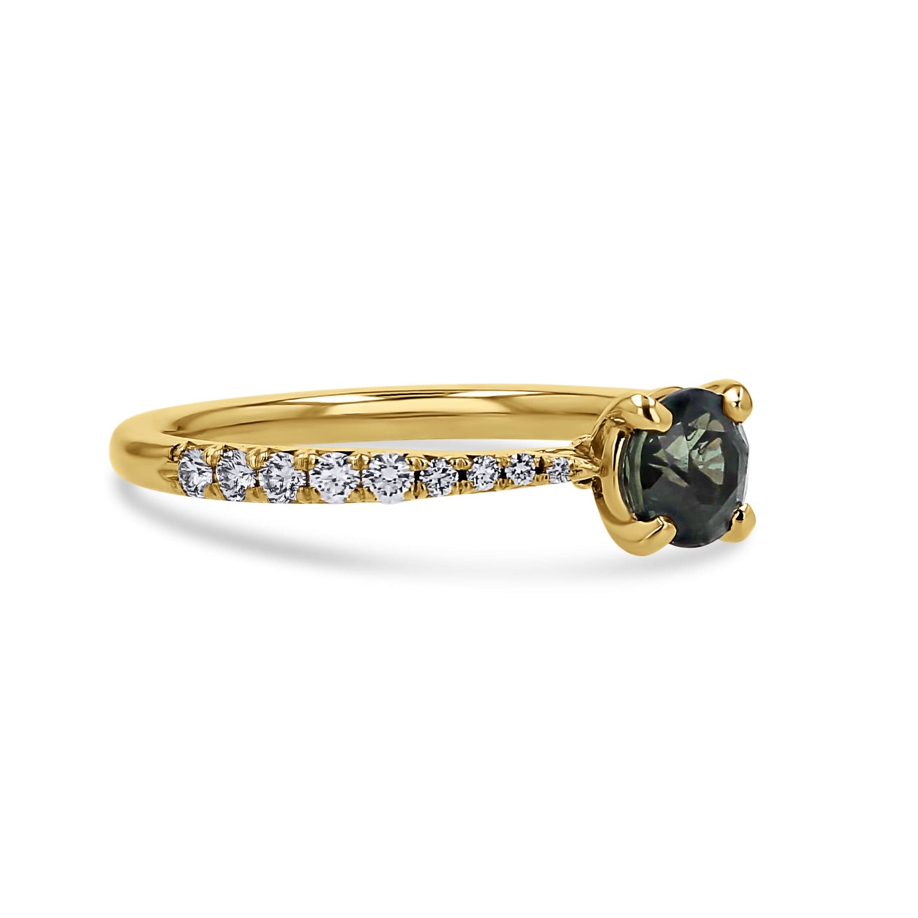 Gold ring with a black gemstone and small diamonds on a white background side