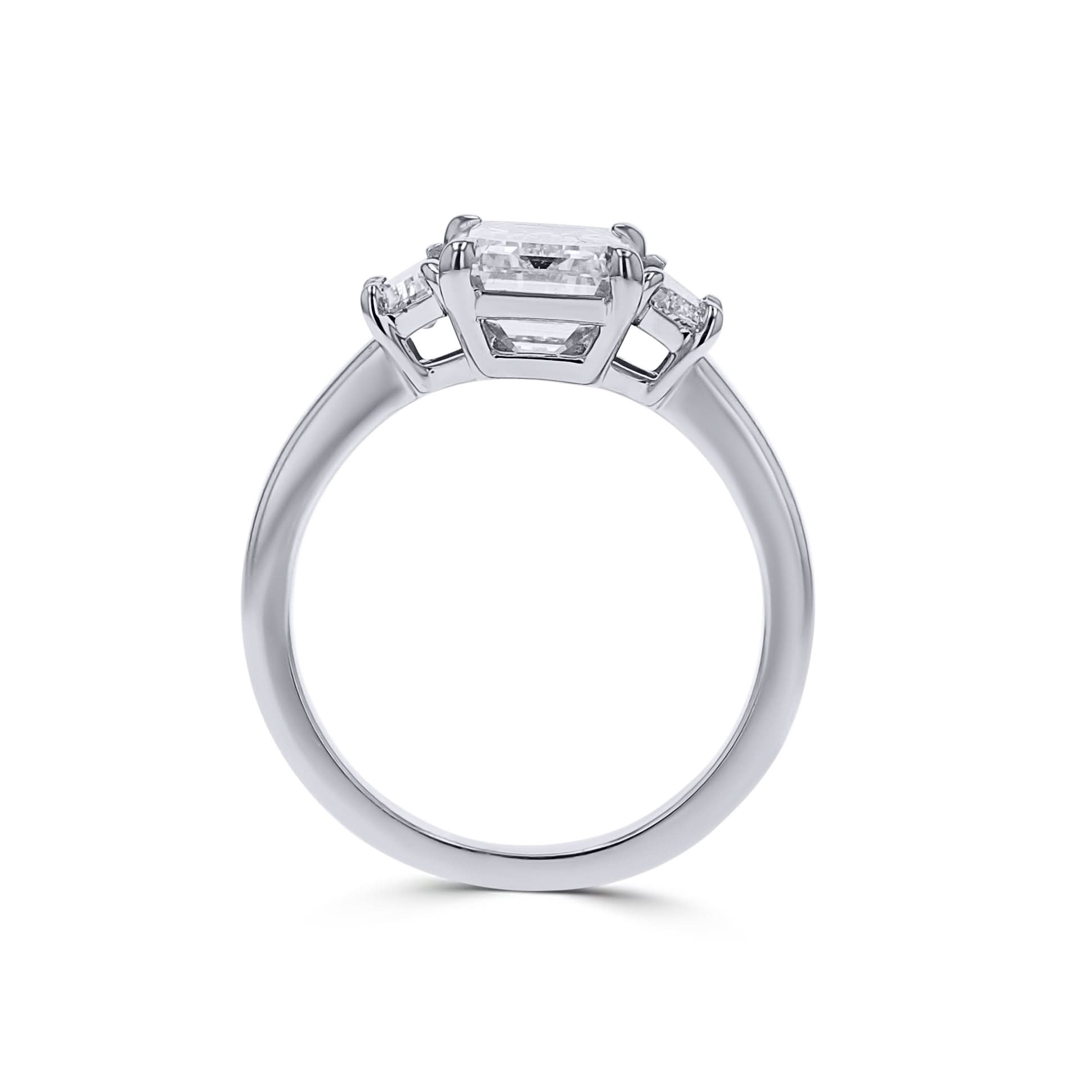 Platinum Emerald-Cut Three-Stone Diamond Engagement Ring - Skeie's Jewelers