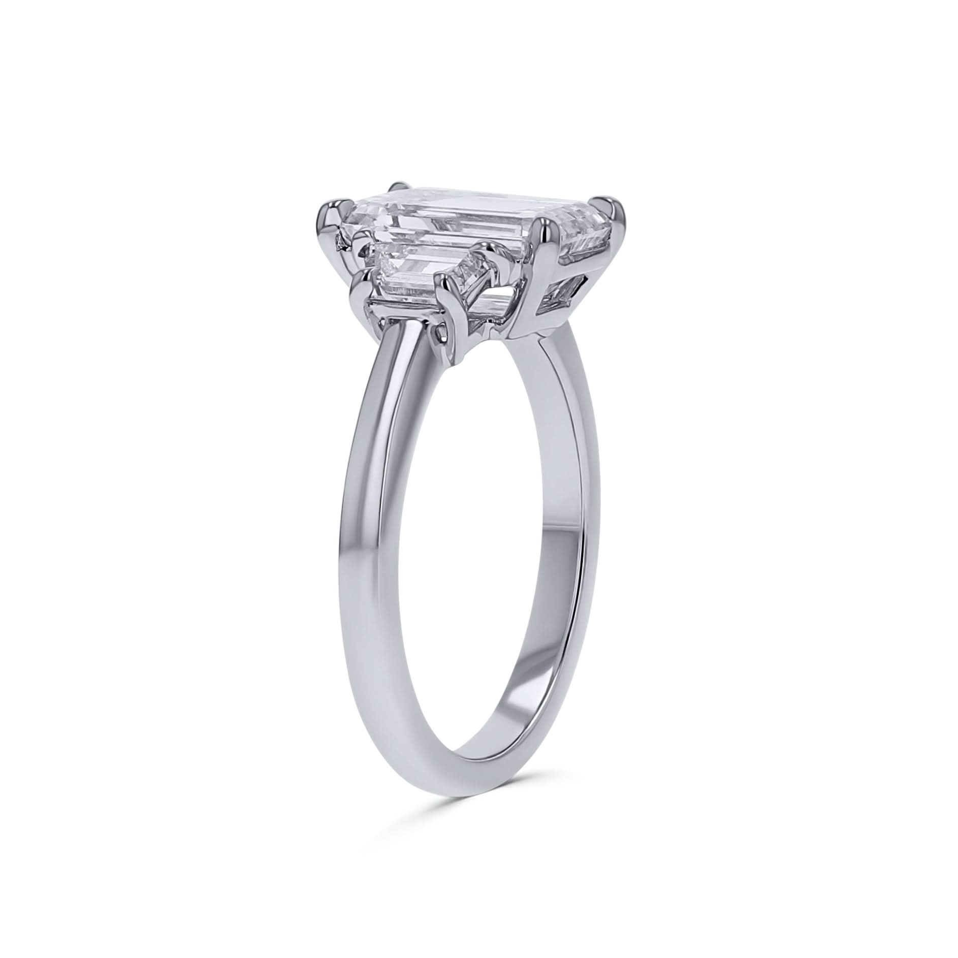 Platinum Emerald-Cut Three-Stone Diamond Engagement Ring - Skeie's Jewelers
