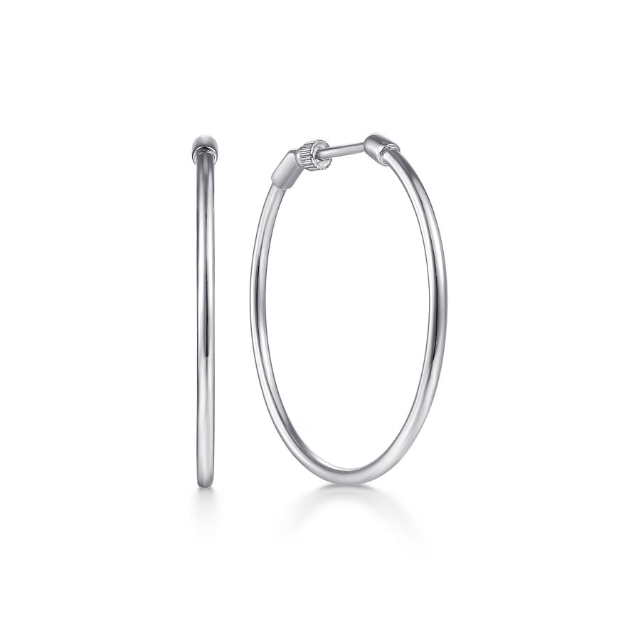white gold hoop earrings on a white background