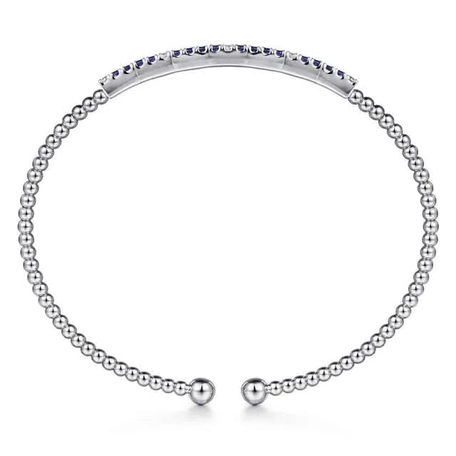 white beaded bracelet with beads on white background