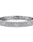 Diamond ring with intricate design on a white background