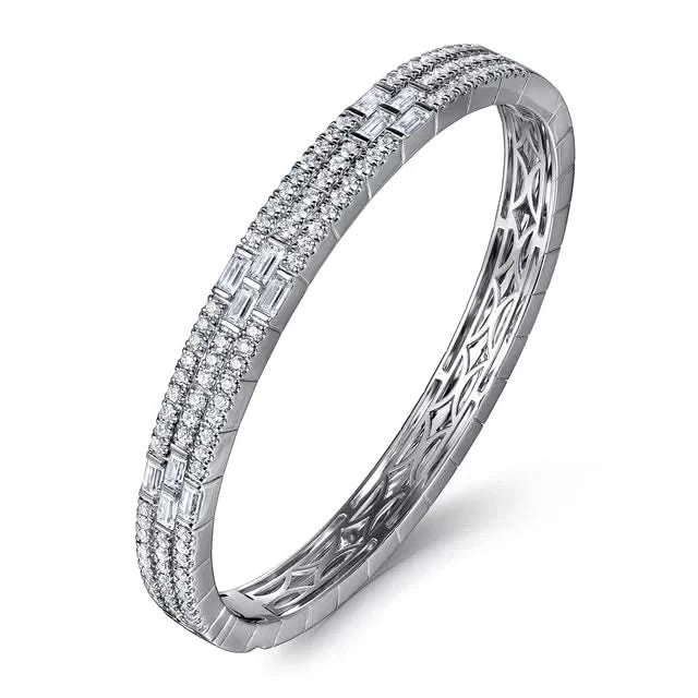 white gold bracelet with diamond accents on a white background