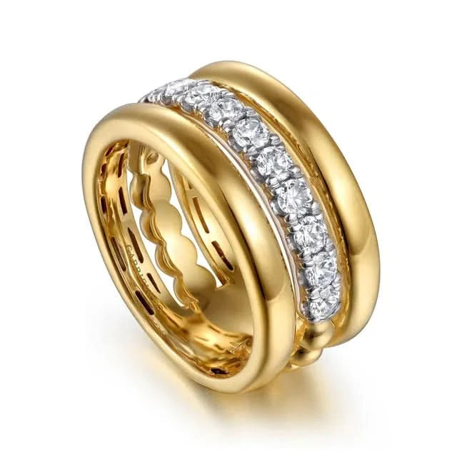 gold ring with diamond accents on a white background angled
