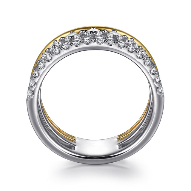 Two-tone ring with diamonds on a white background